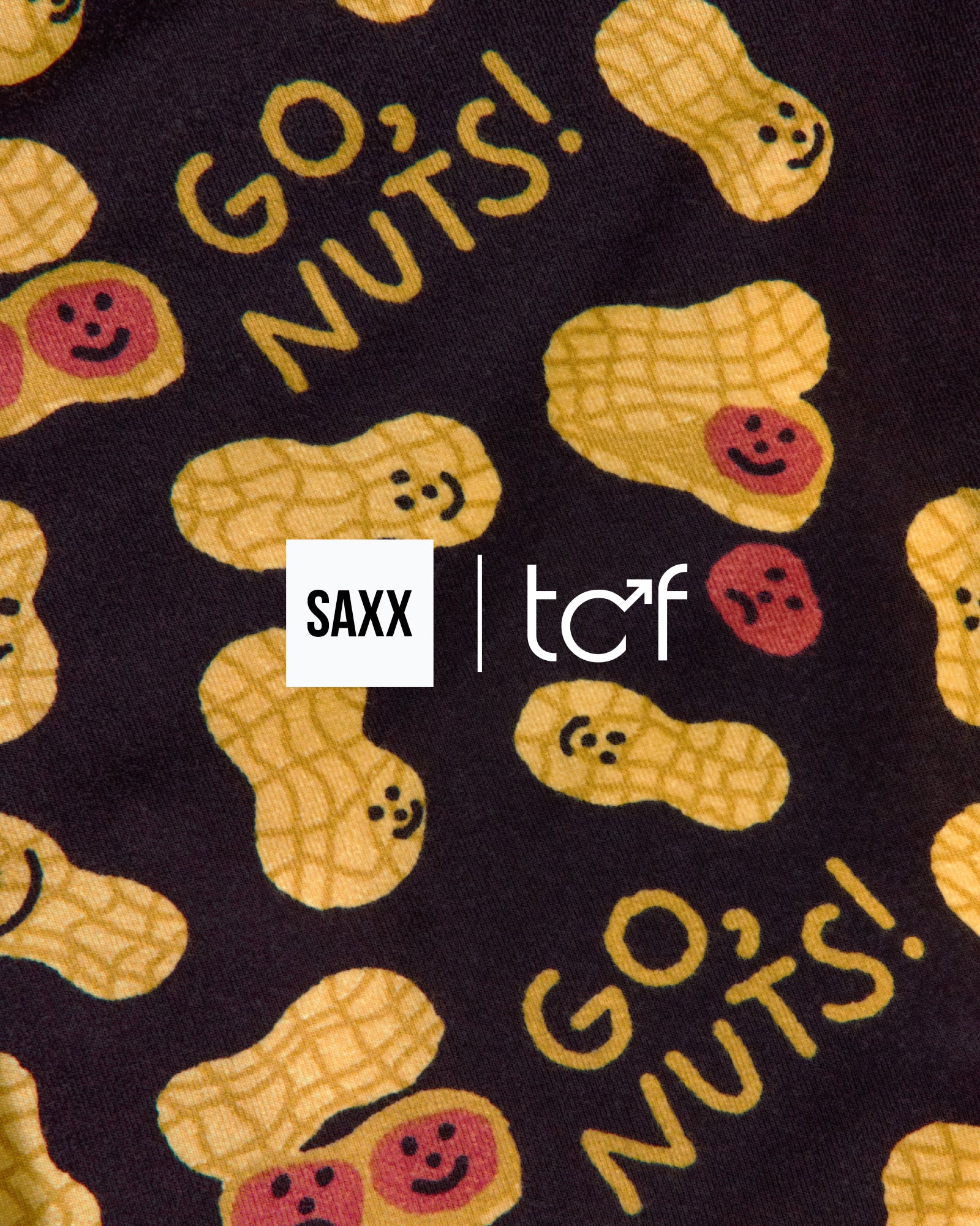 Patterned fabric with yellow peanuts and 'GO' NUTS!' text on a black background, featuring SAXX and tcf logos.