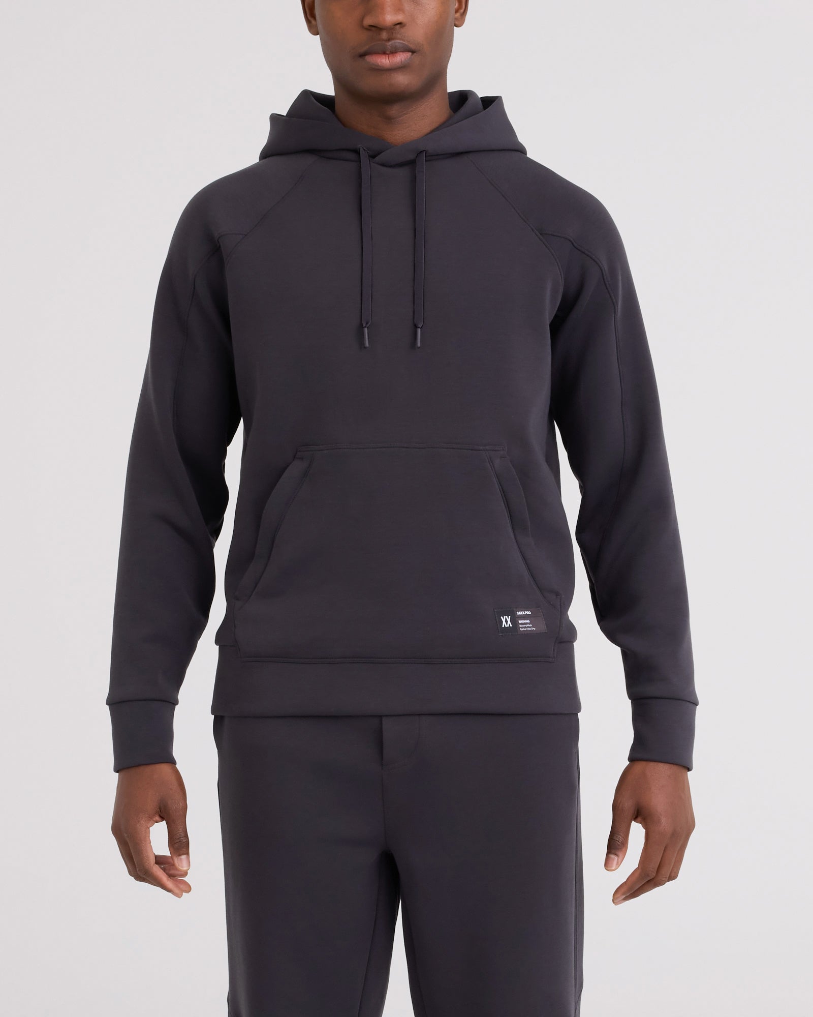 Front - Model wearing Phase Hoodie in Faded Black