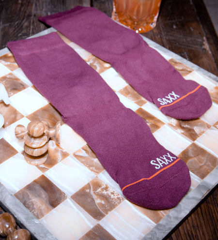Maroon socks on a chess board