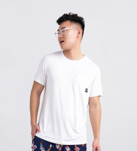 Man wearing a white sleep shirt