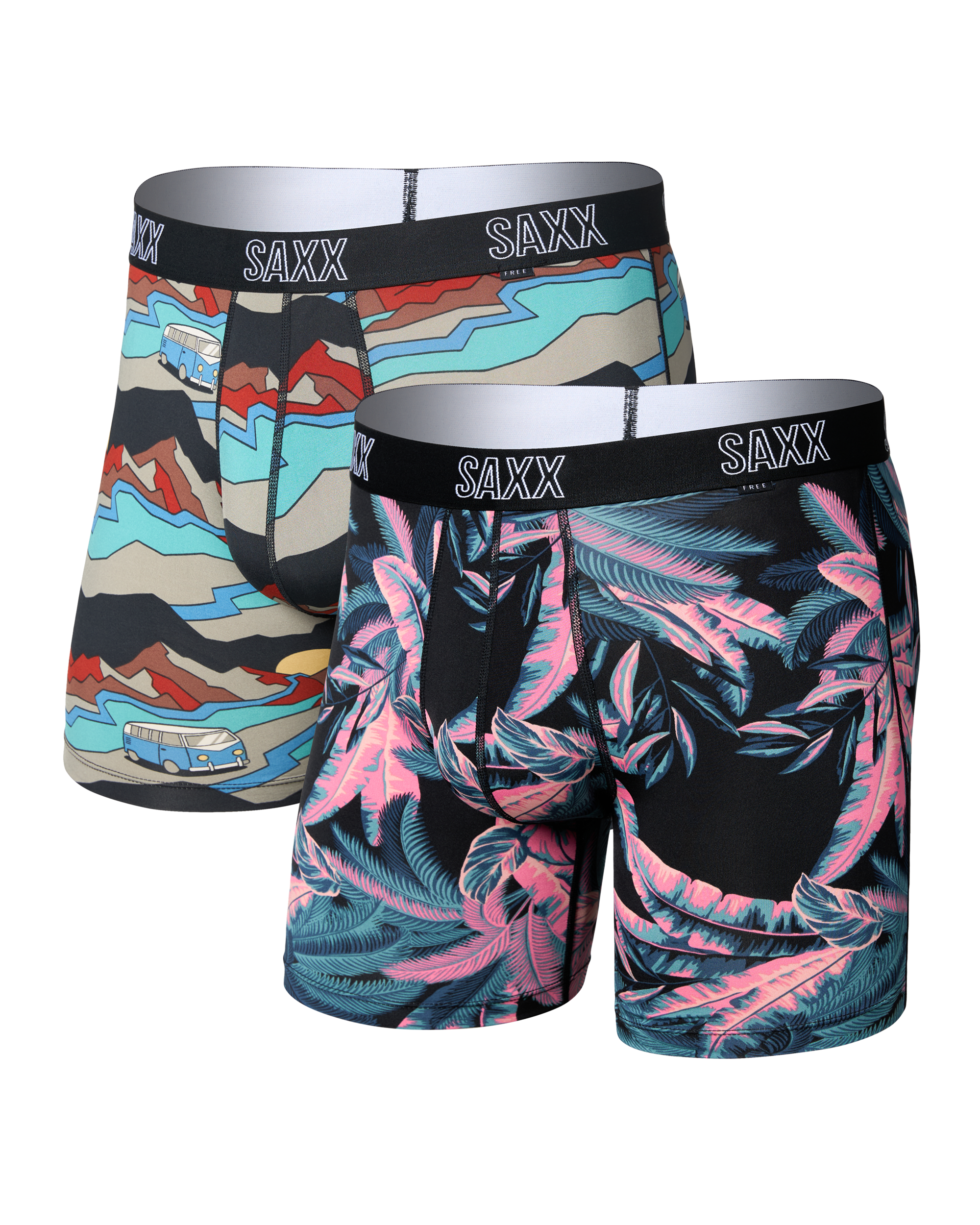 Two pairs of SAXX men's boxer briefs shown on a white background. The pair in the back has a multicolor abstract pattern, and the pair in the front has a black base with pink and teal tropical leaf print.