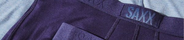 Thee different pairs of blue shaded underwear in a row