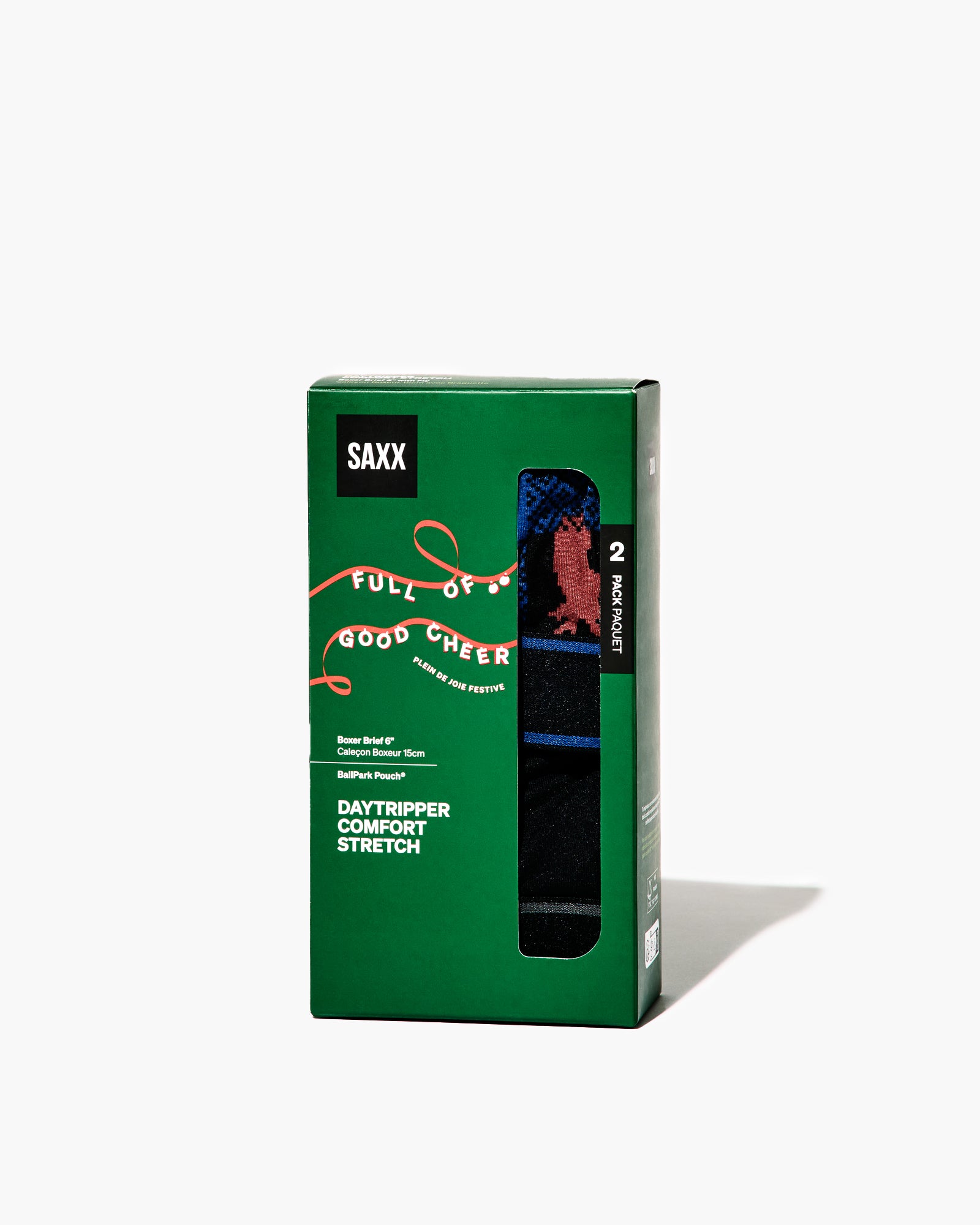 Green packaging of SAXX socks with brand logo and product details on a white background