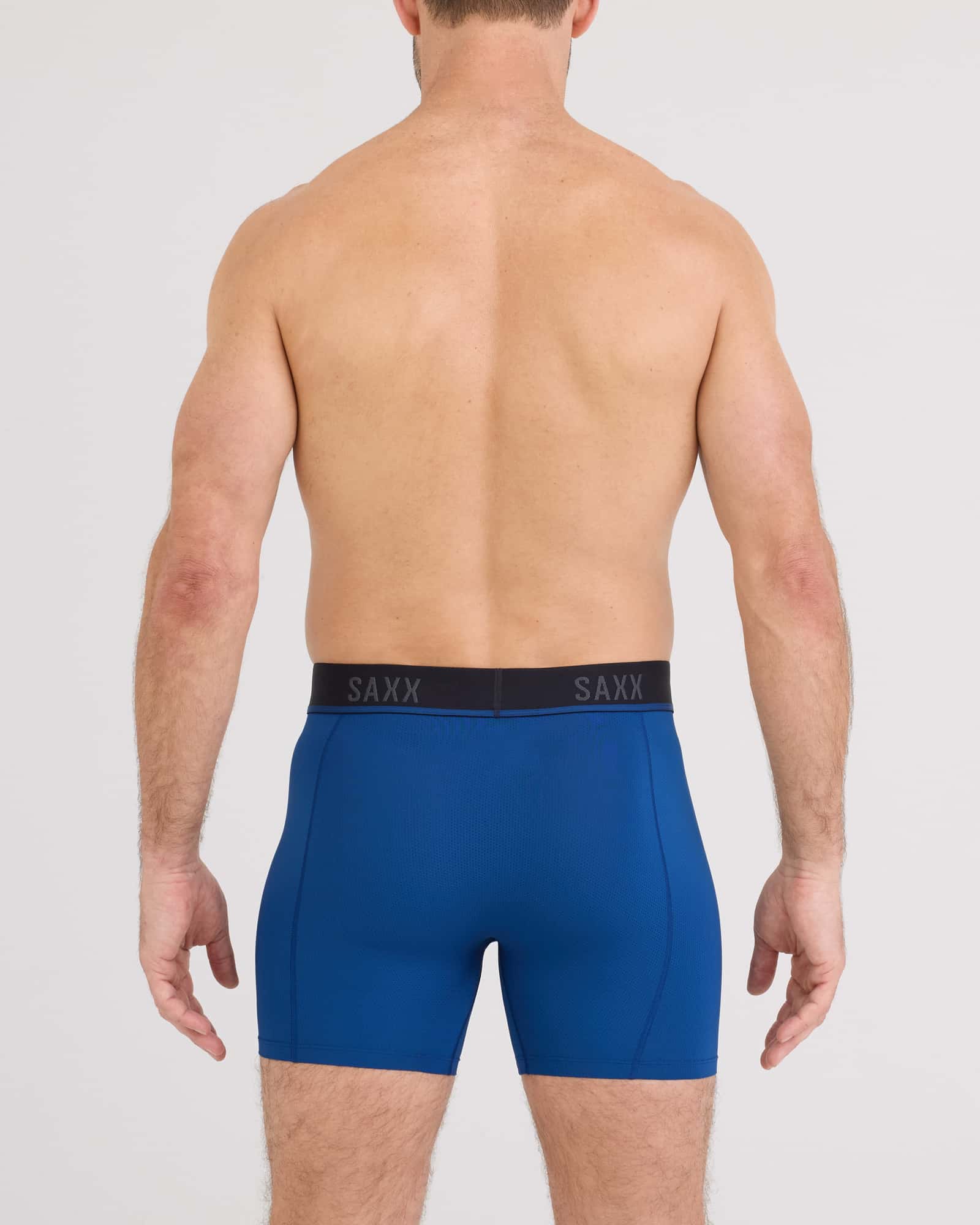 Back - Model wearing  Kinetic Light-Compression Mesh Boxer Brief in Navy Dawn