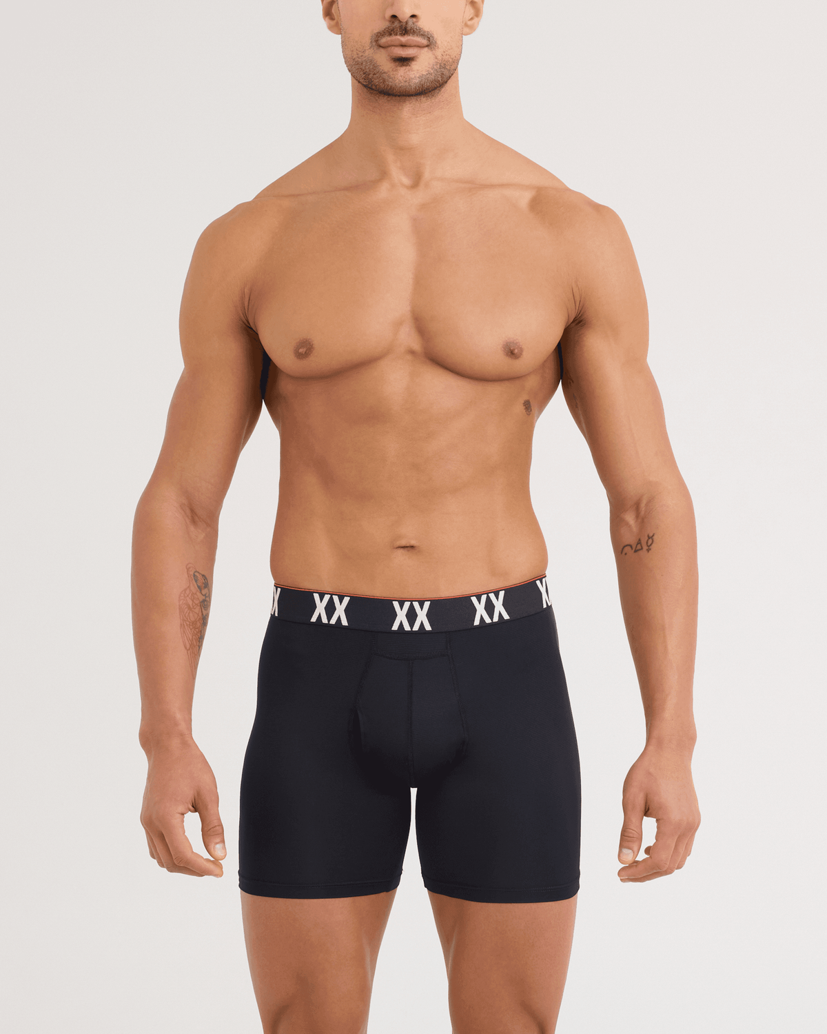 Front - Model wearing Multi-Sport Mesh Boxer Brief in Black/XX Waistband