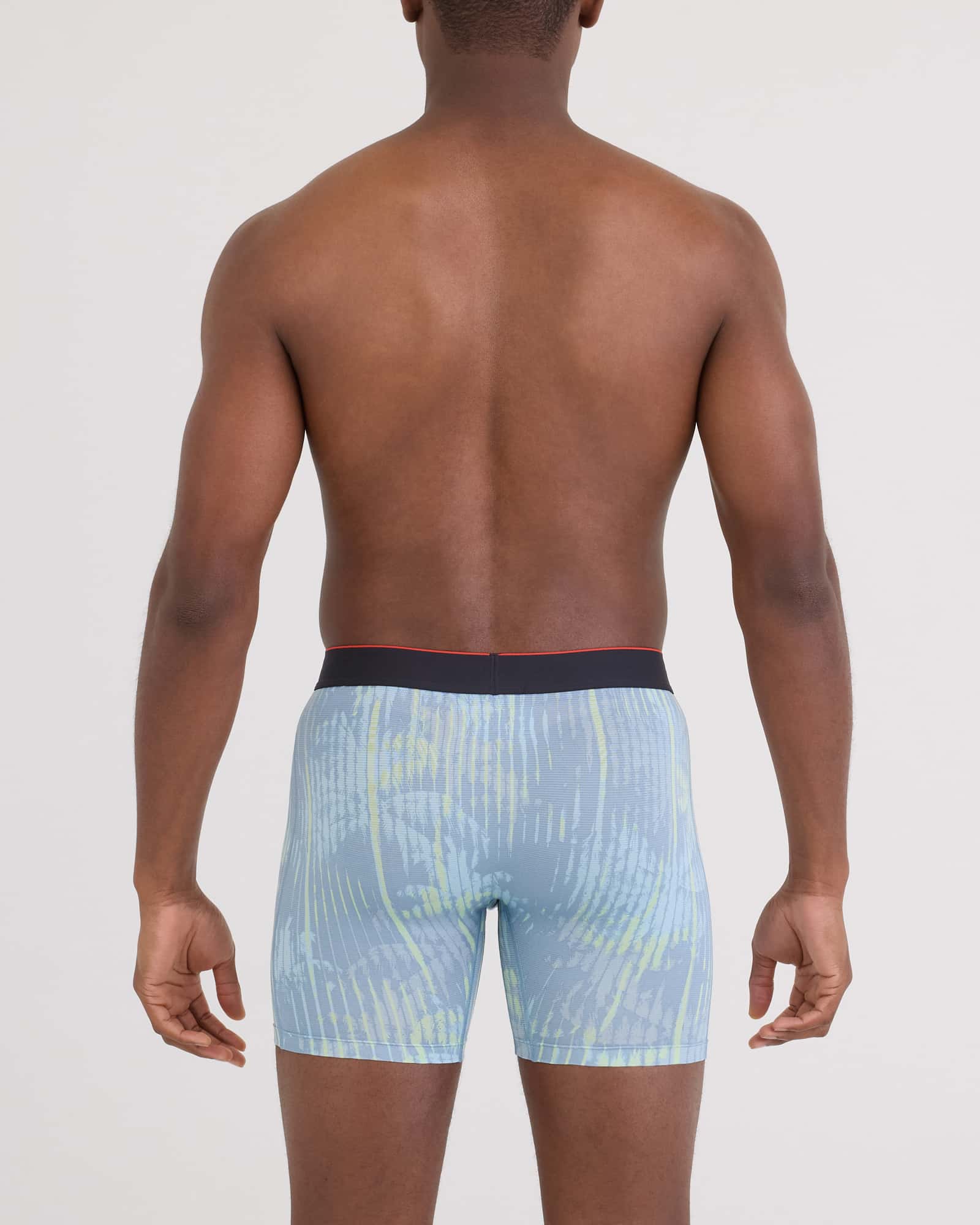 Back - Model wearing Multi-Sport Mesh Boxer Brief Fly in Palm Screen-Faded Denim