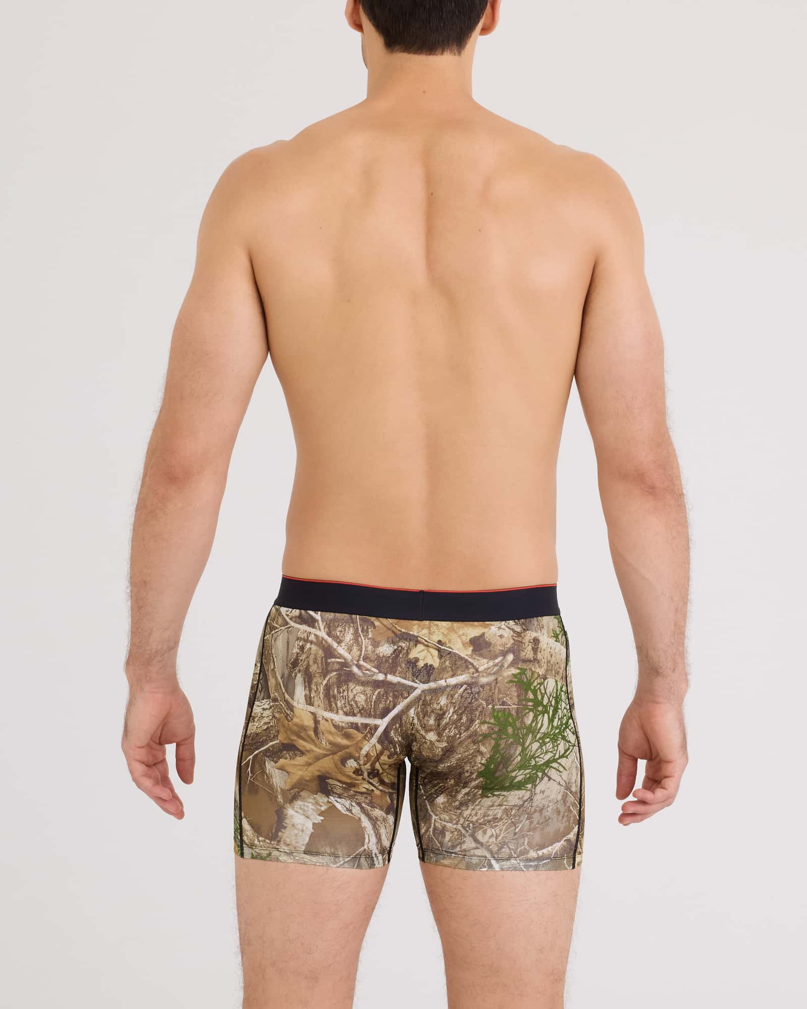 Back - Model wearing Multi-Sport Mesh Boxer Brief Fly in Realtree Edge