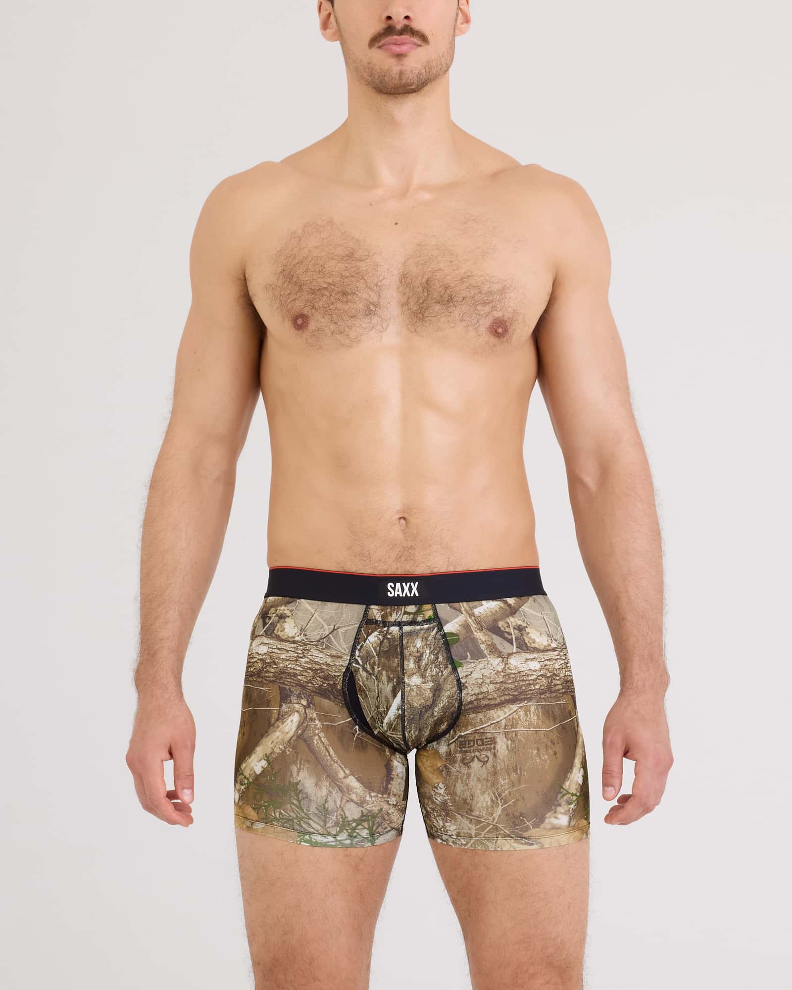 Front - Model wearing Multi-Sport Mesh Boxer Brief Fly in Realtree Edge