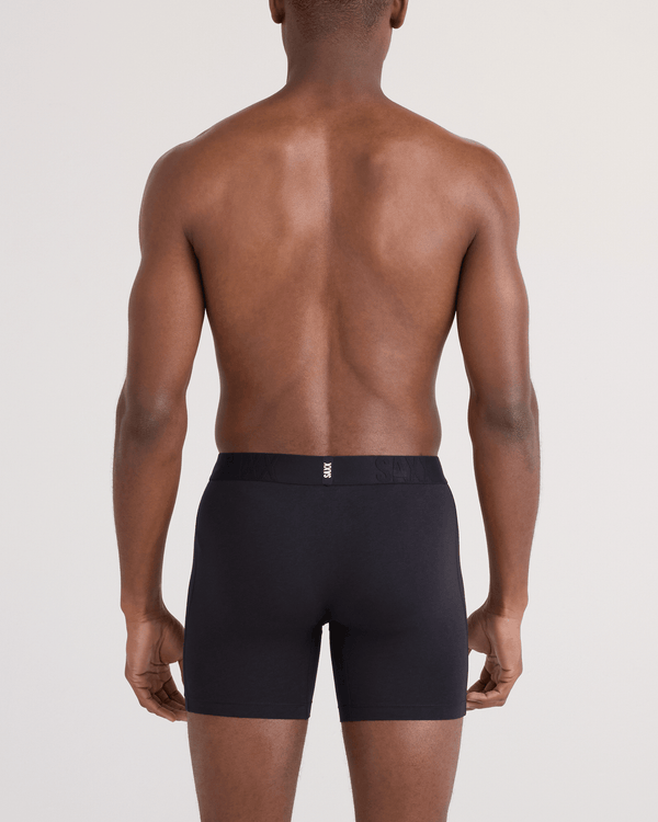 Back - Model wearing DropTemp Cooling Cotton Boxer Brief Fly 3 Pack in Black