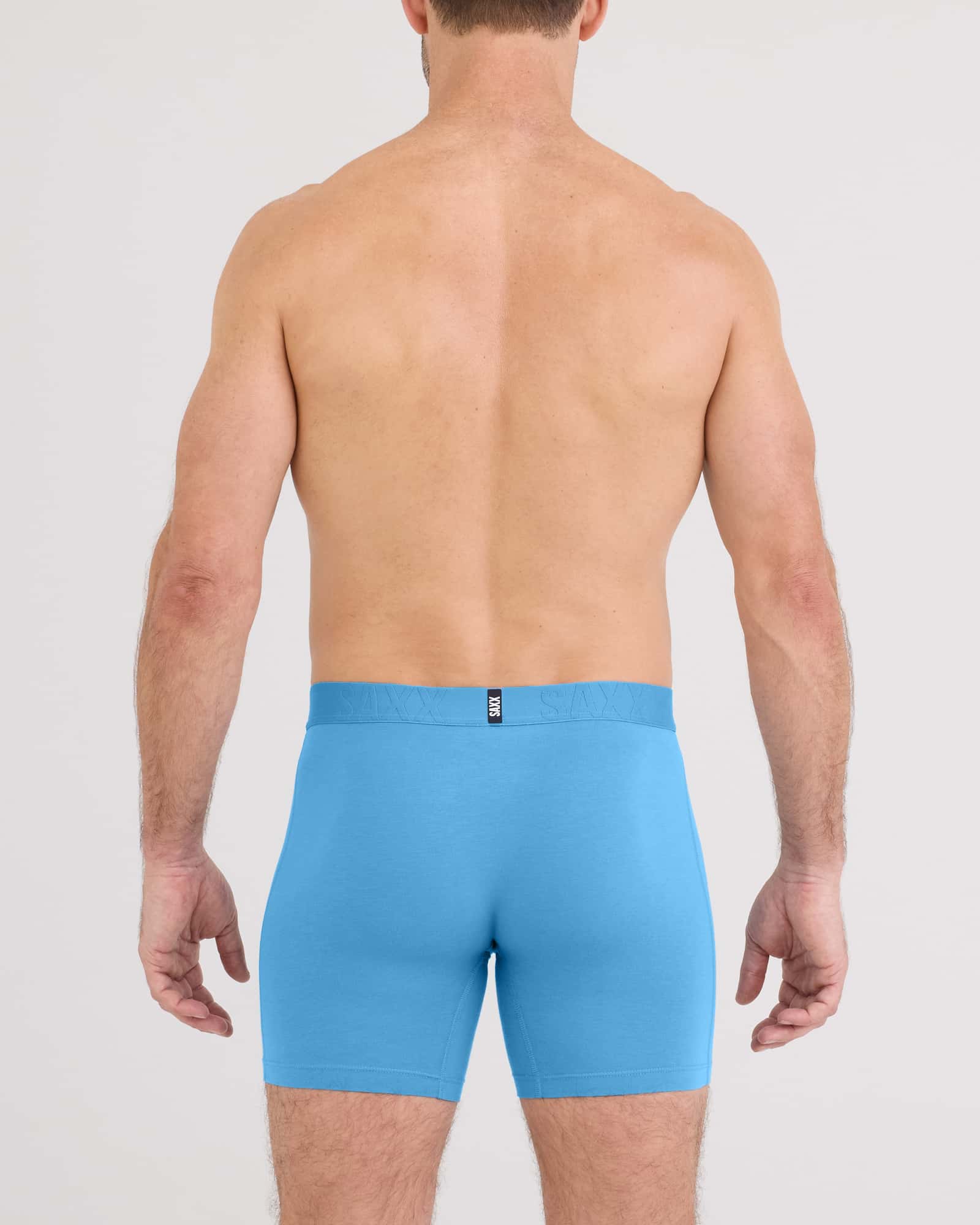 Back - Model wearing Droptemp Cooling Cotton Boxer Brief Fly in Parisian Blue