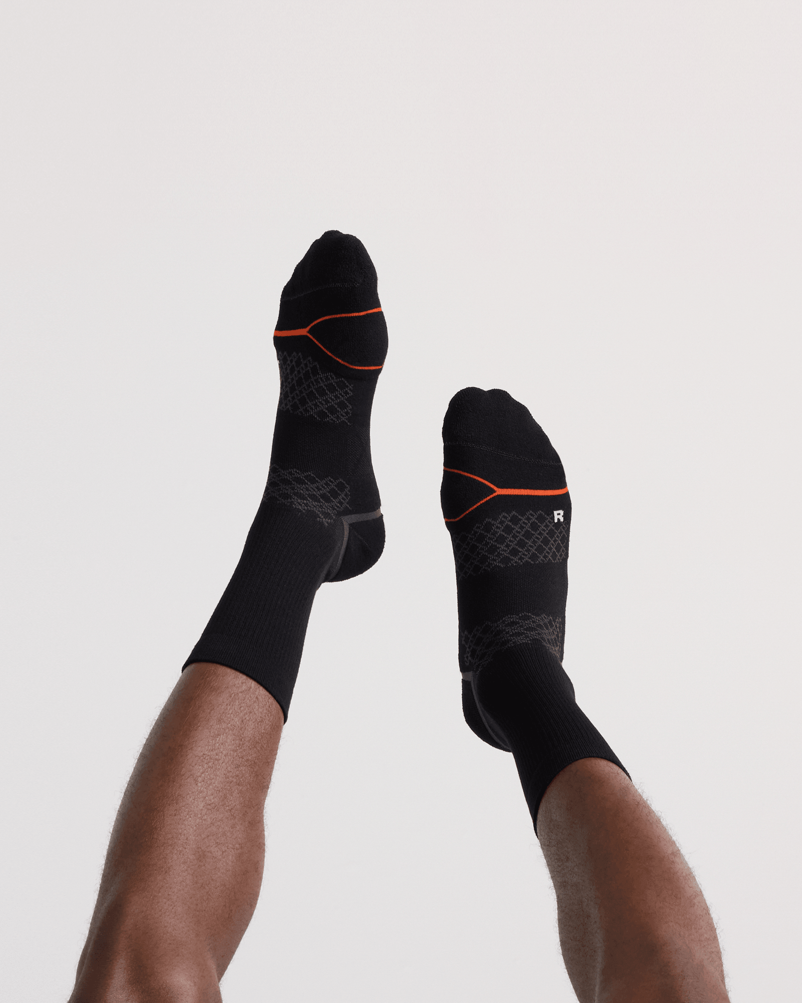 Back - Model wearing  Foot Hold Mid-Weight Crew Sock in Black