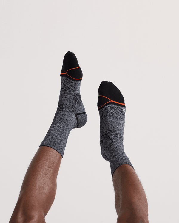 Back - Model wearing Foot Hold Mid-Weight Crew Sock in Black/White