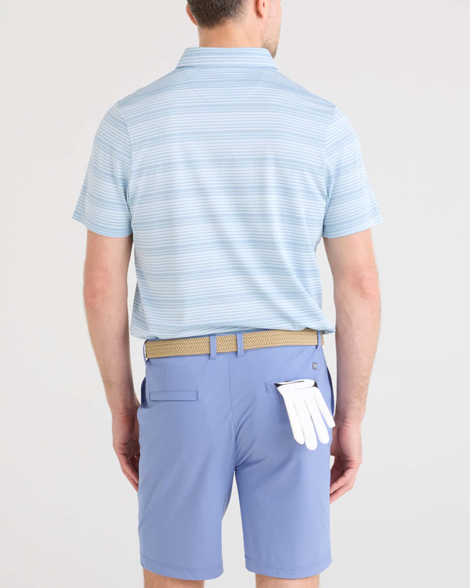Back - Model wearing Droptemp Dry Polo in Shadow Stripe-Light Blue