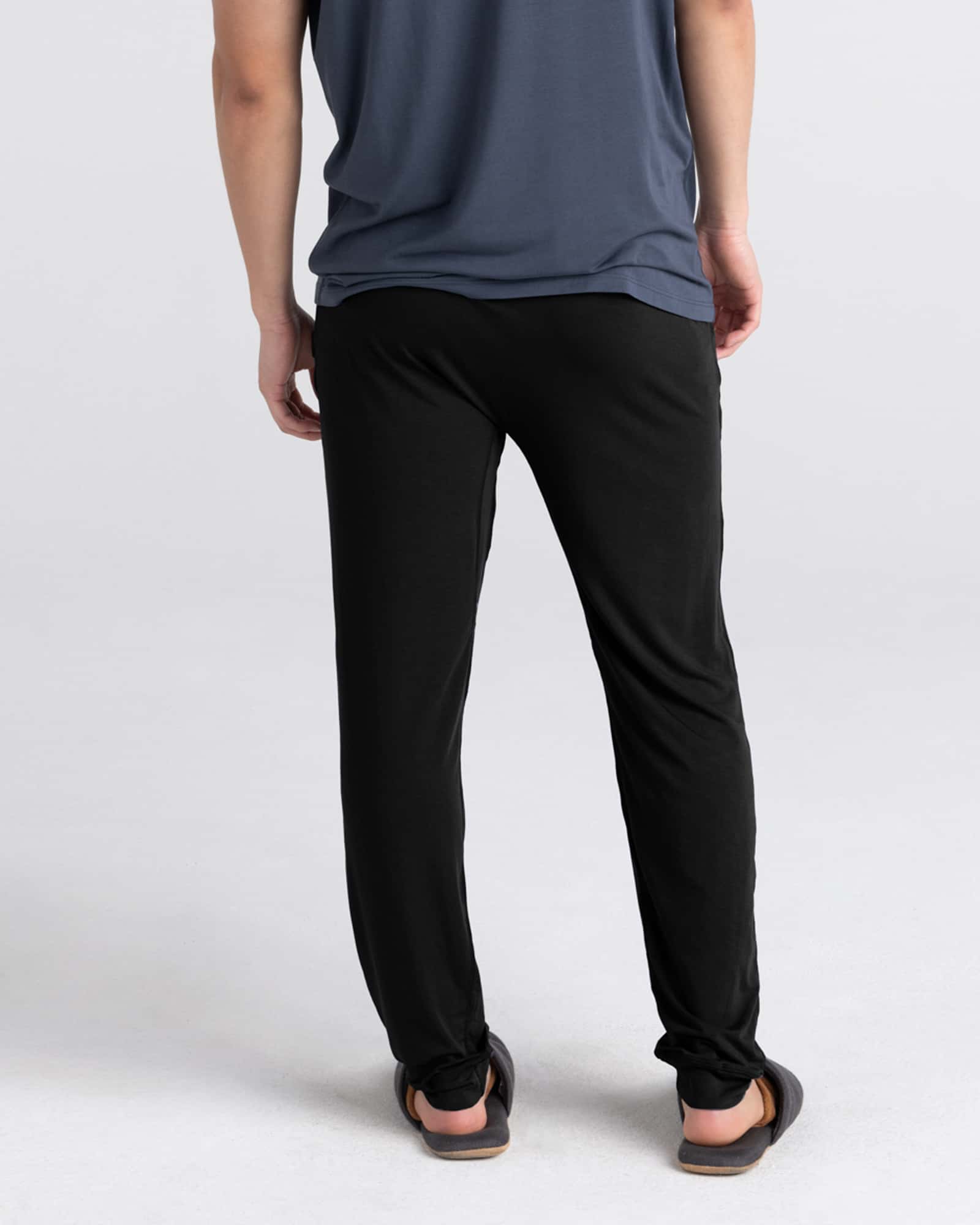 Back - Model wearing Snooze Pant in Black
