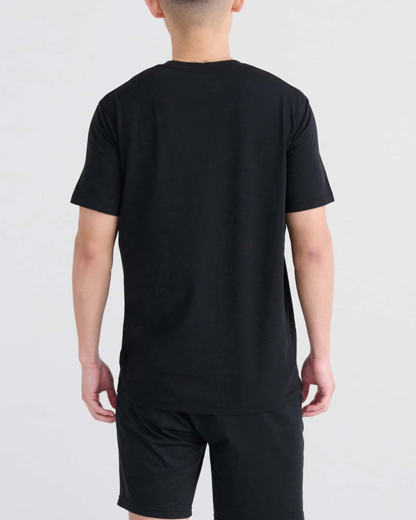 Back - Model wearing Droptemp Cooling Cotton Tee in Black