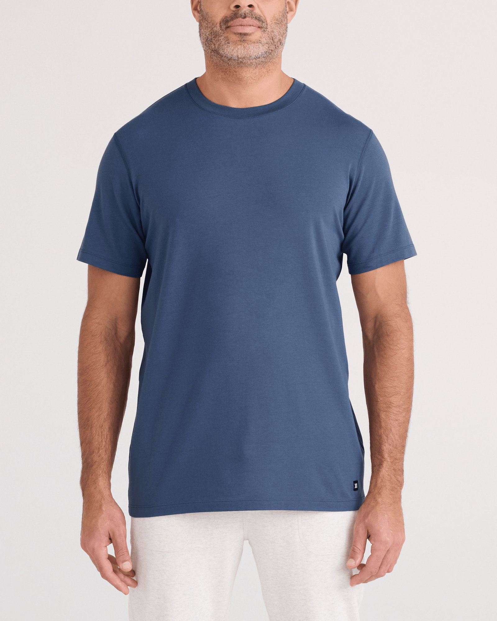 Front - Model wearing  DropTemp Cooling Cotton Tee in Washed Indigo