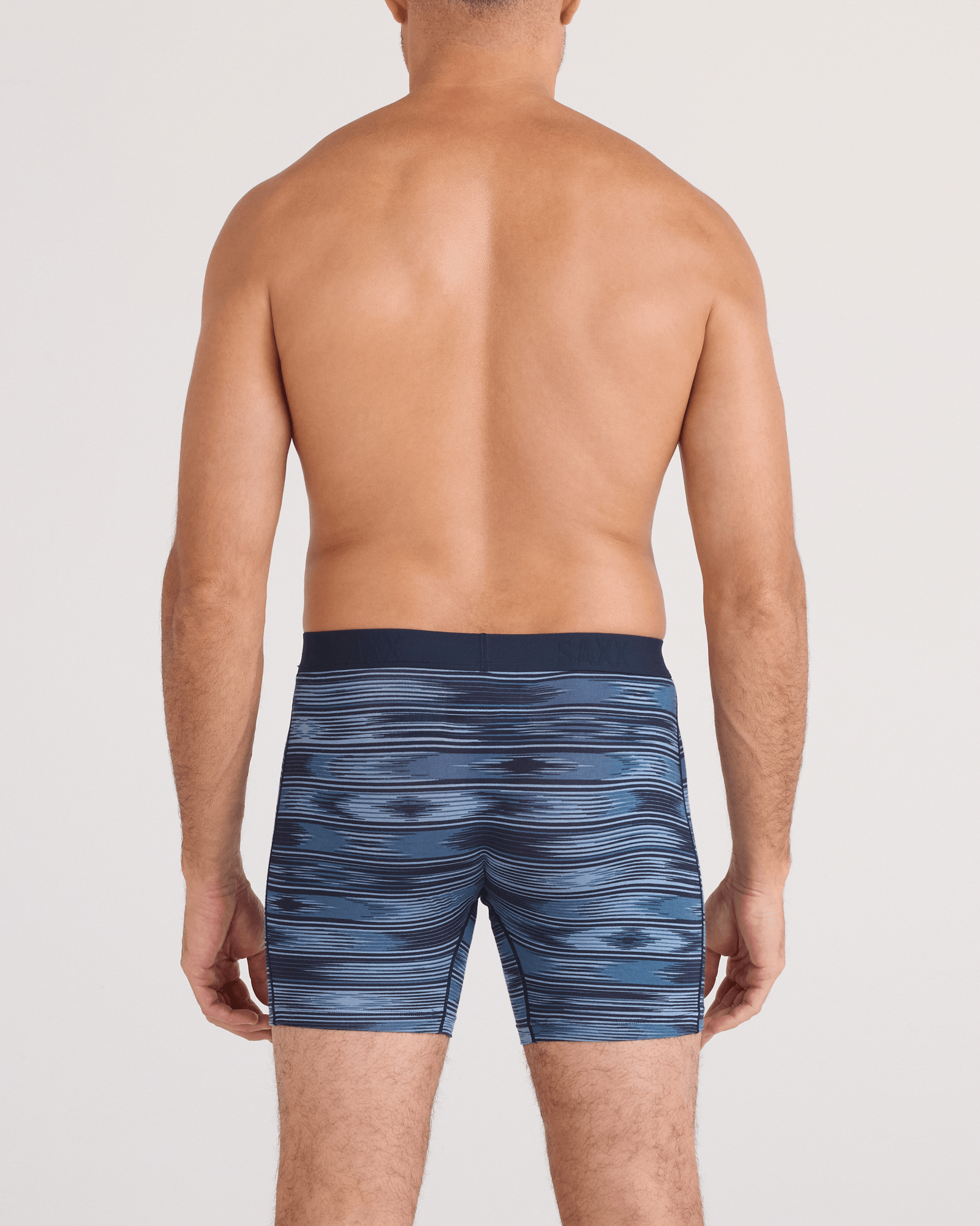 Back - Model wearing Vibe Xtra Soft Comfort Boxer Brief Fly in Ikat Stripe-Dark Denim