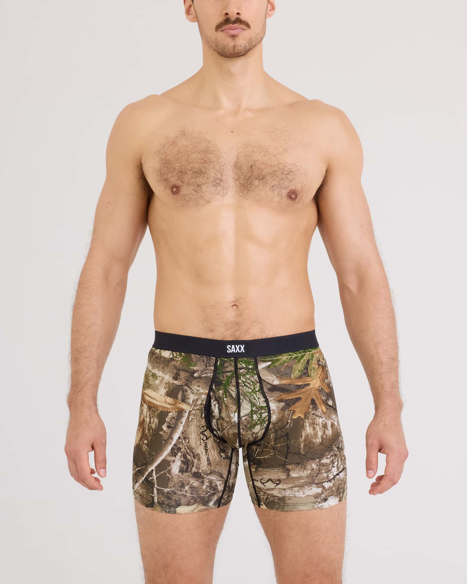 Front - Model wearing Vibe Xtra Soft Comfort Boxer Brief Fly in Realtree Edge-Multi