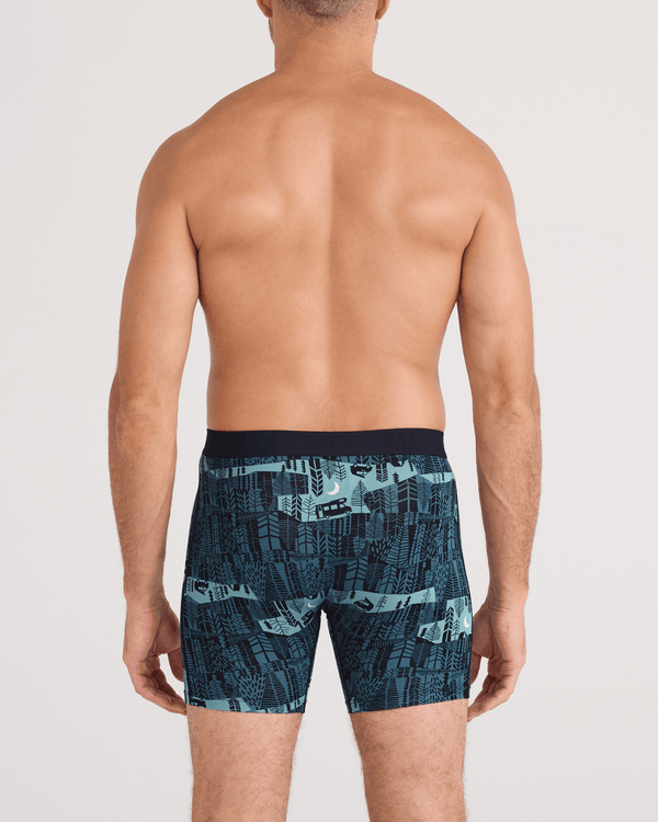 Back - Model wearing Vibe Xtra Soft Comfort Boxer Brief Fly in The Clearing-Storm Blue