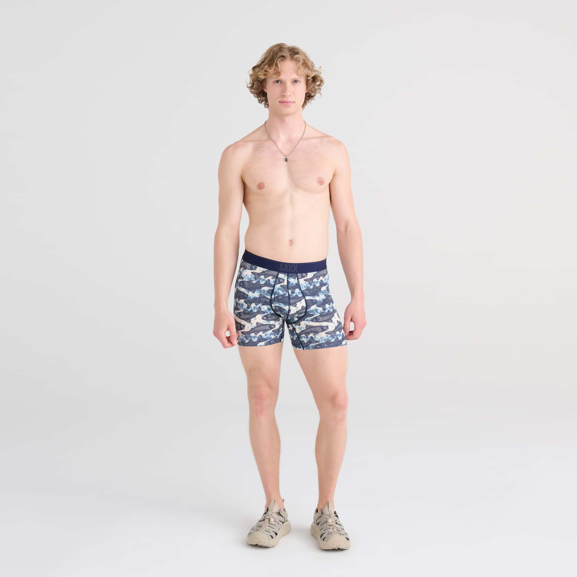 Front - Model wearing Quest Baselayer Boxer Brief in Upstream- Twilight
