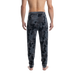 Back - Model wearing Snooze Sleep Pant in Supersize Camo- Dark Charcoal
