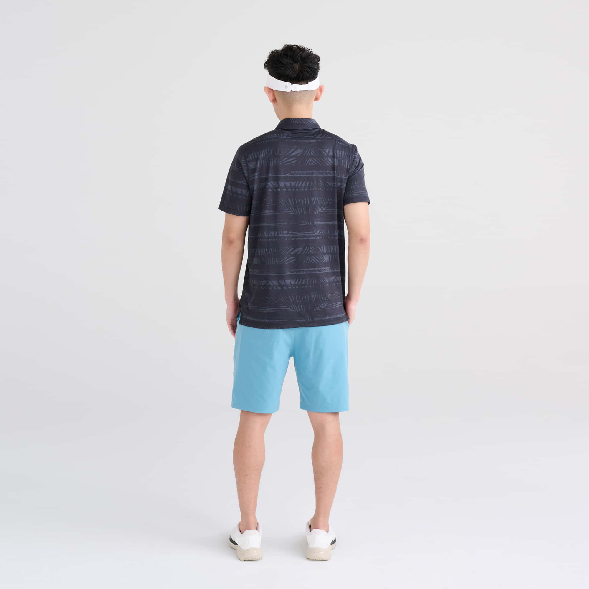 Back - Model wearing DropTemp All Day Cooling Polo in Shade Stripe- Turbulence