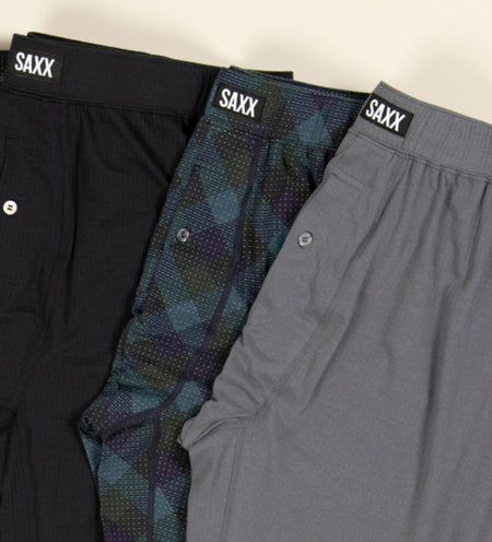 Four pairs of cooling sleep pants in different colors and patterns