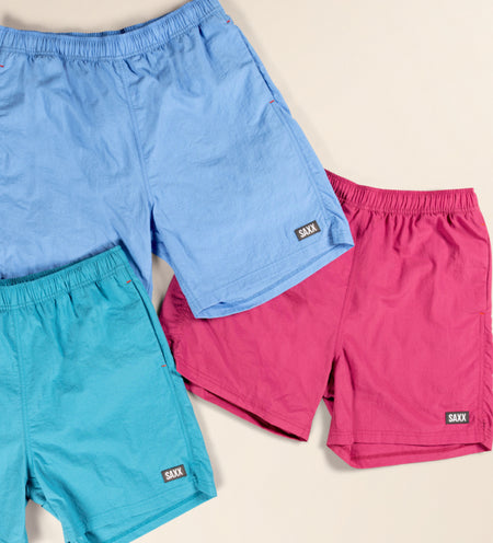 Three pairs of cooling 2N1 Swim Shorts in different colors