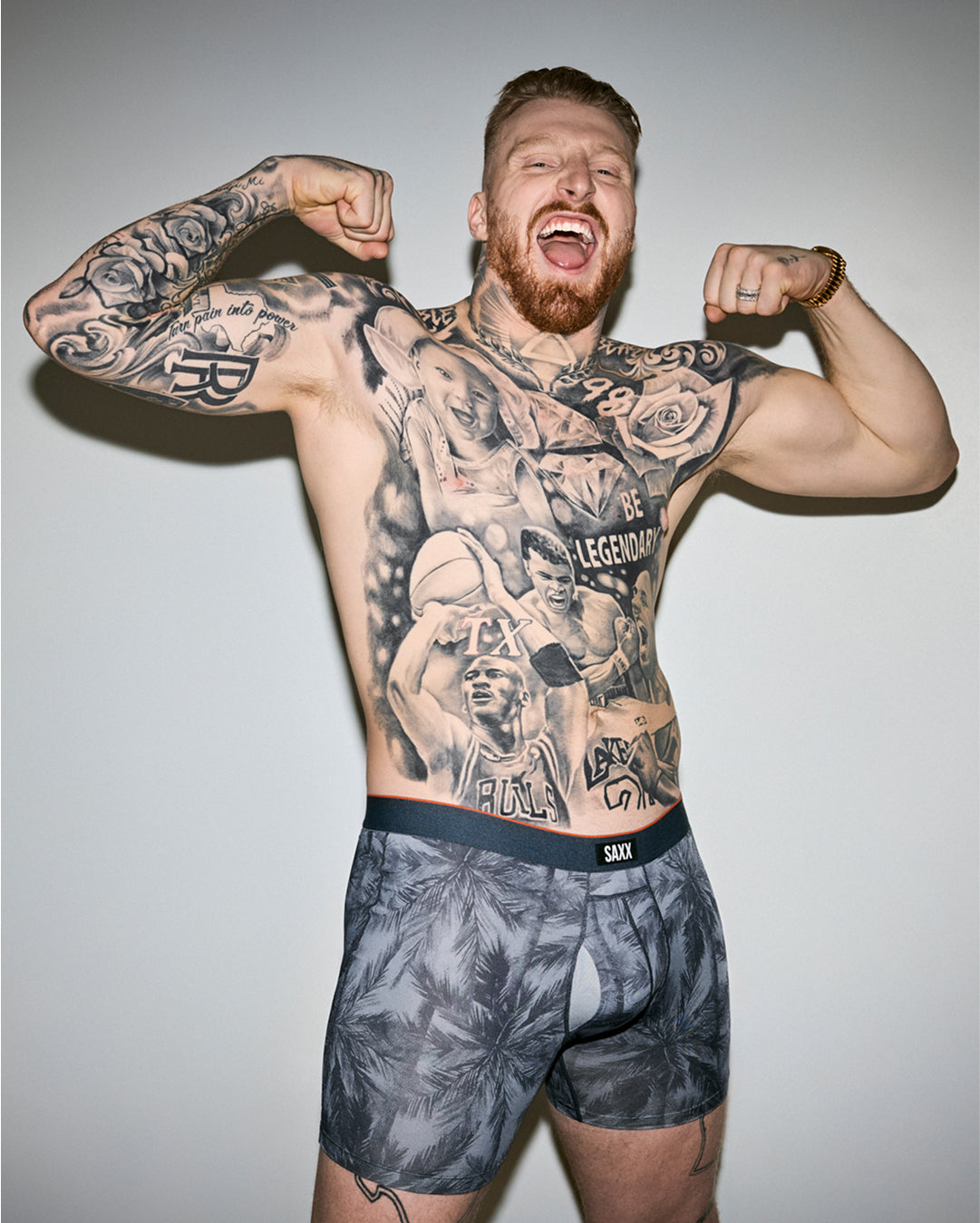 Maxx Crosby posing in Multi-Sport Mesh Boxer Briefs.