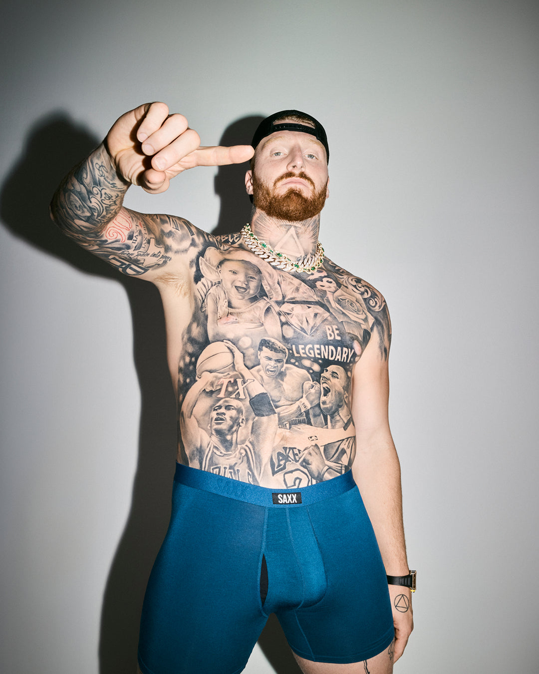 Maxx Crosby posing in Multi-Sport Mesh Boxer Briefs.