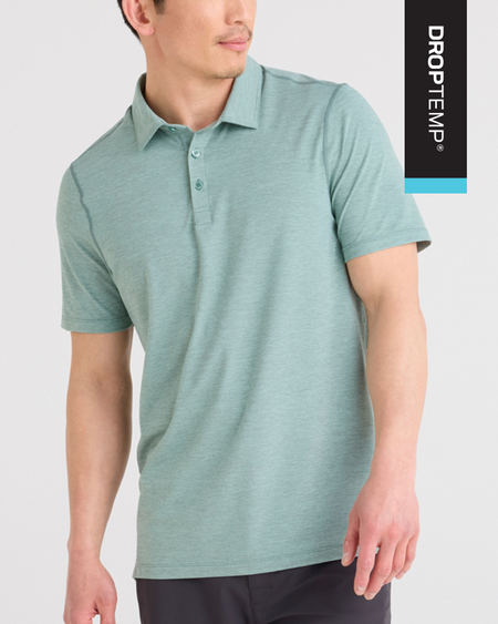 a man wearing a green polo shirt