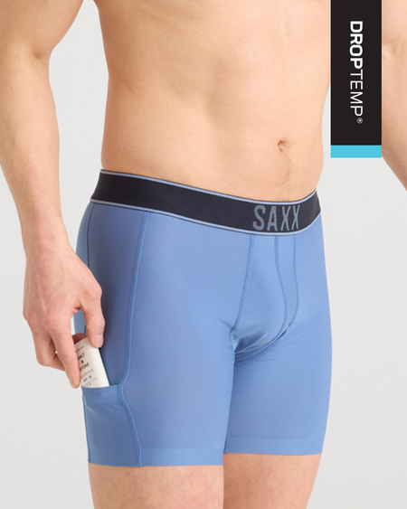 a man wearing blue boxer briefs