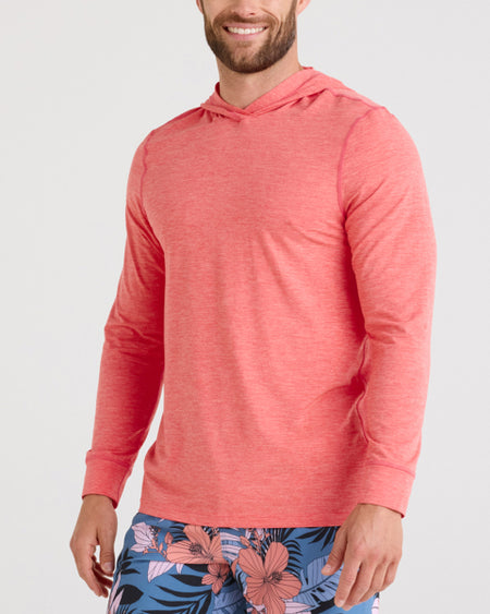 a man wearing a pink shirt