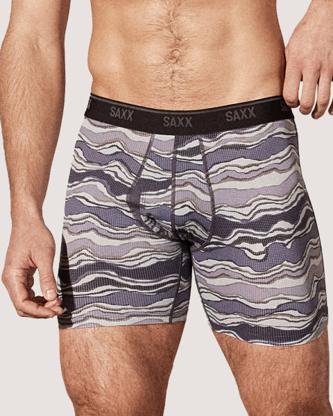 Patterned boxer briefs with SAXX branding on a neutral background