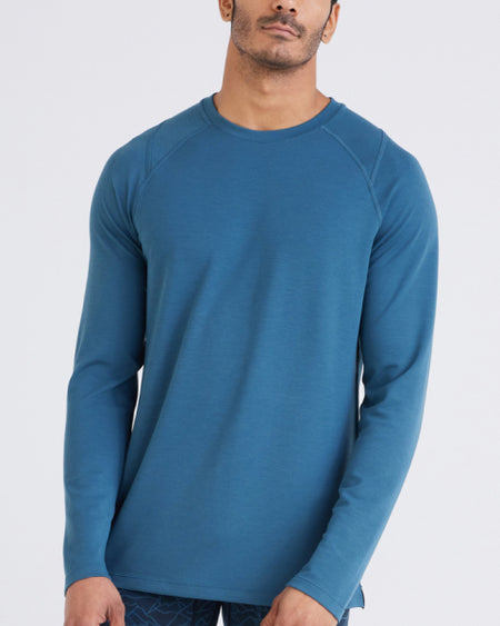 a man in a blue shirt