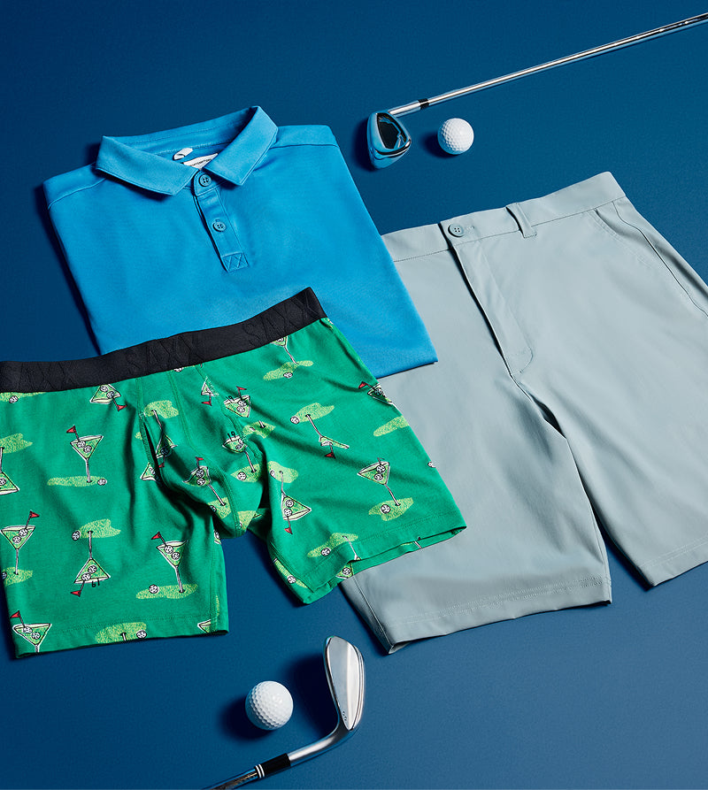Golf-themed clothing and accessories on a blue background