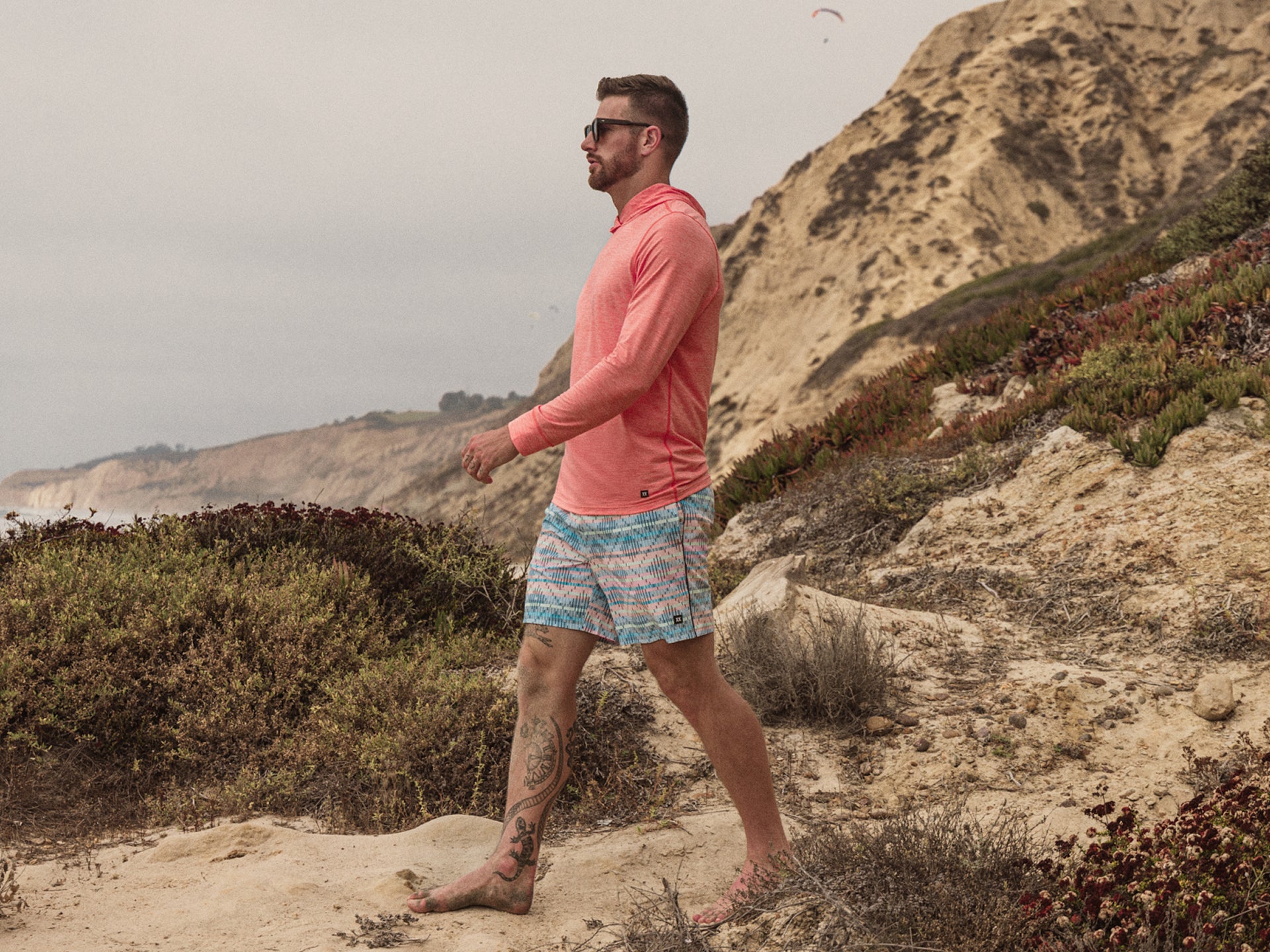 Man walking along a beach