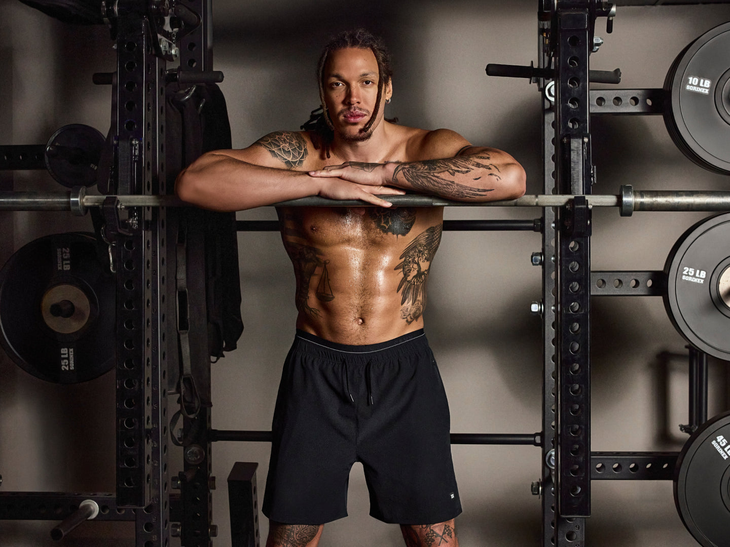 SAXX Gamechanger and Professional Basketball player Aaron Gordon posing in a gym setting