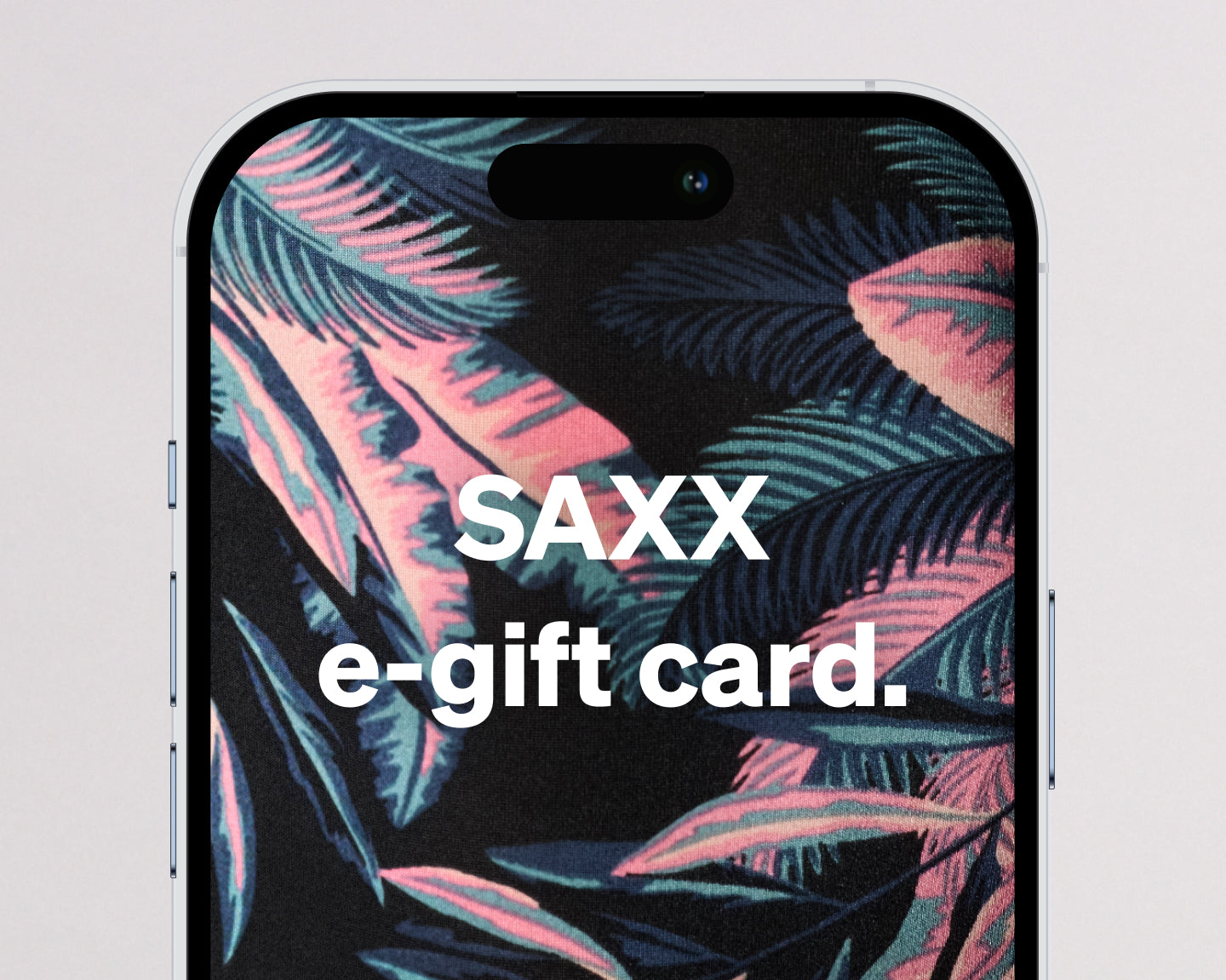 A close-up of a smartphone displaying a tropical leaf pattern with the text 'SAXX e-gift card.' in large white letters.