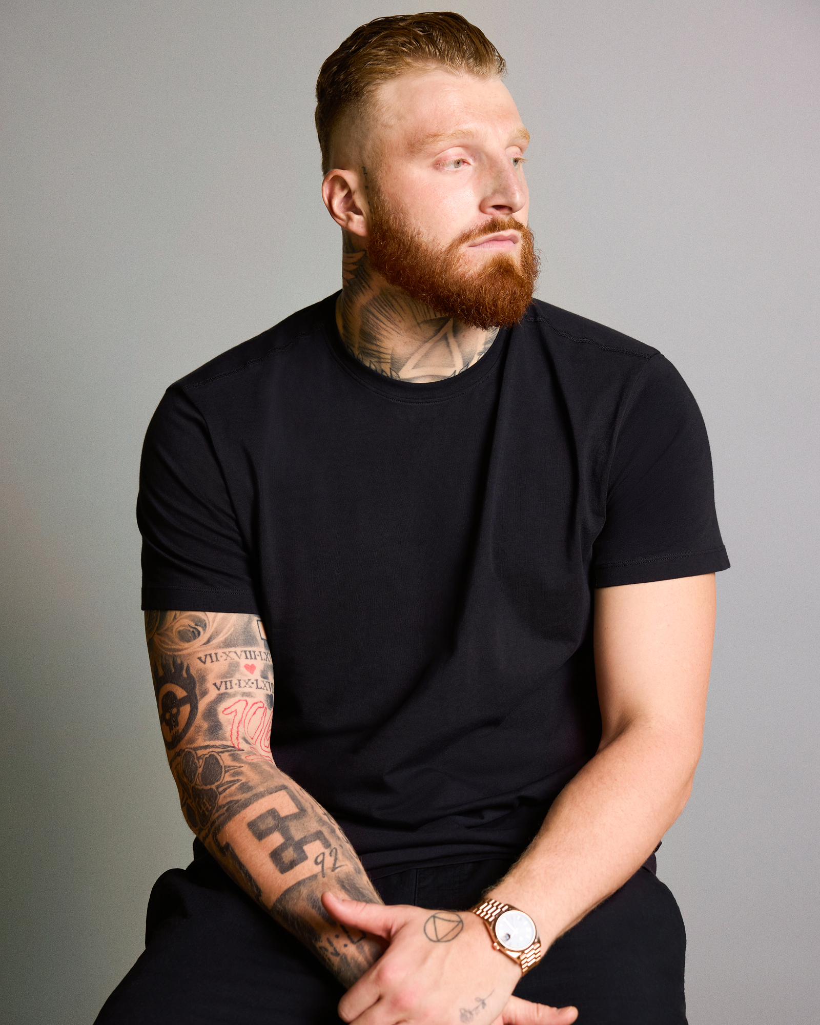 Maxx Crosby wearing SAXX DropTemp Dry Cotton Crew Neck Undershirt in Black