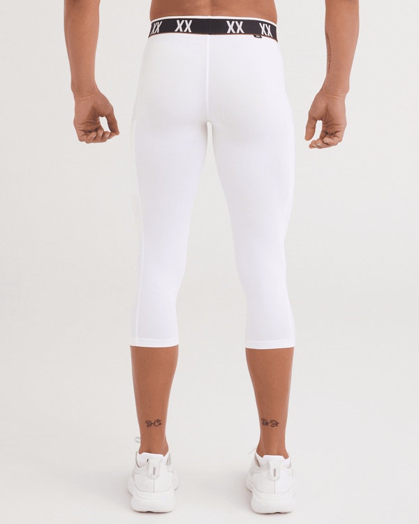 Back - Model wearing Multi-Sport Mesh Tights in White