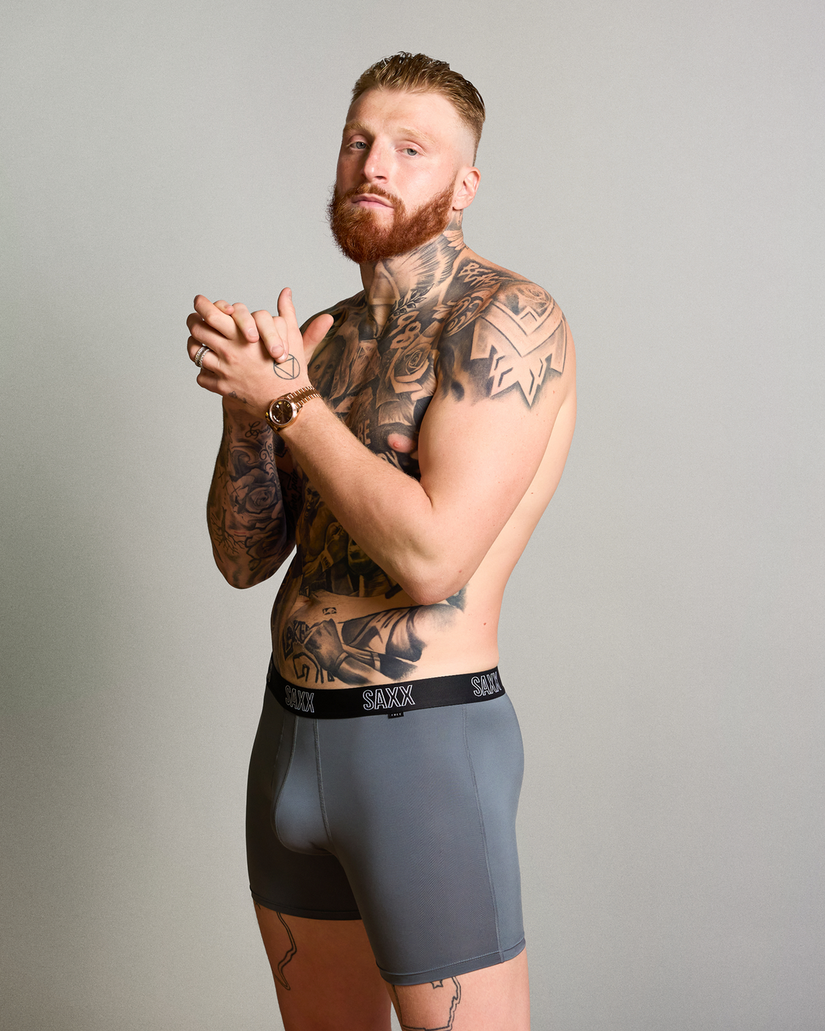 Maxx Crosby wearing SAXX FREE DropTemp All Day Cooling Boxer Brief in Storm