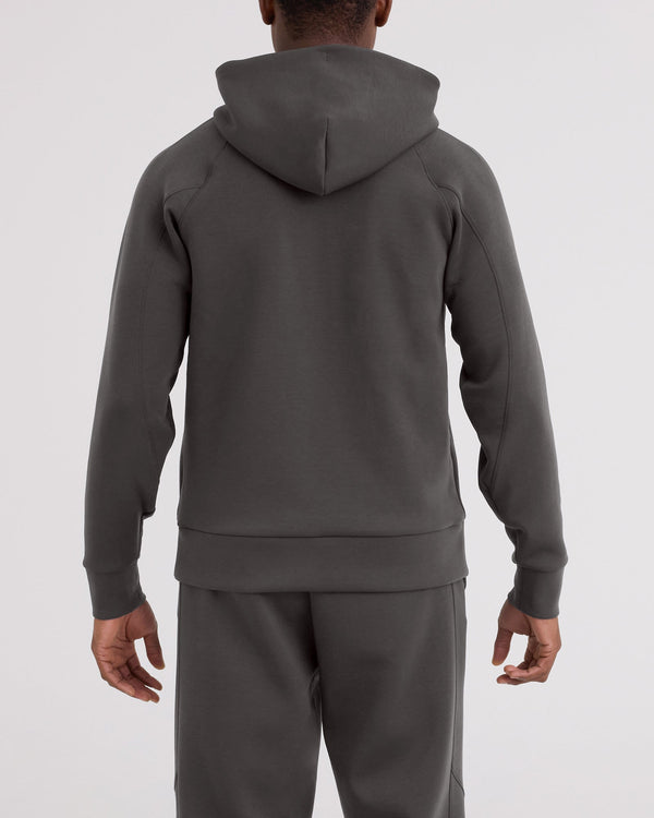 Back - Model wearing Phase Hoodie in Dark Grey