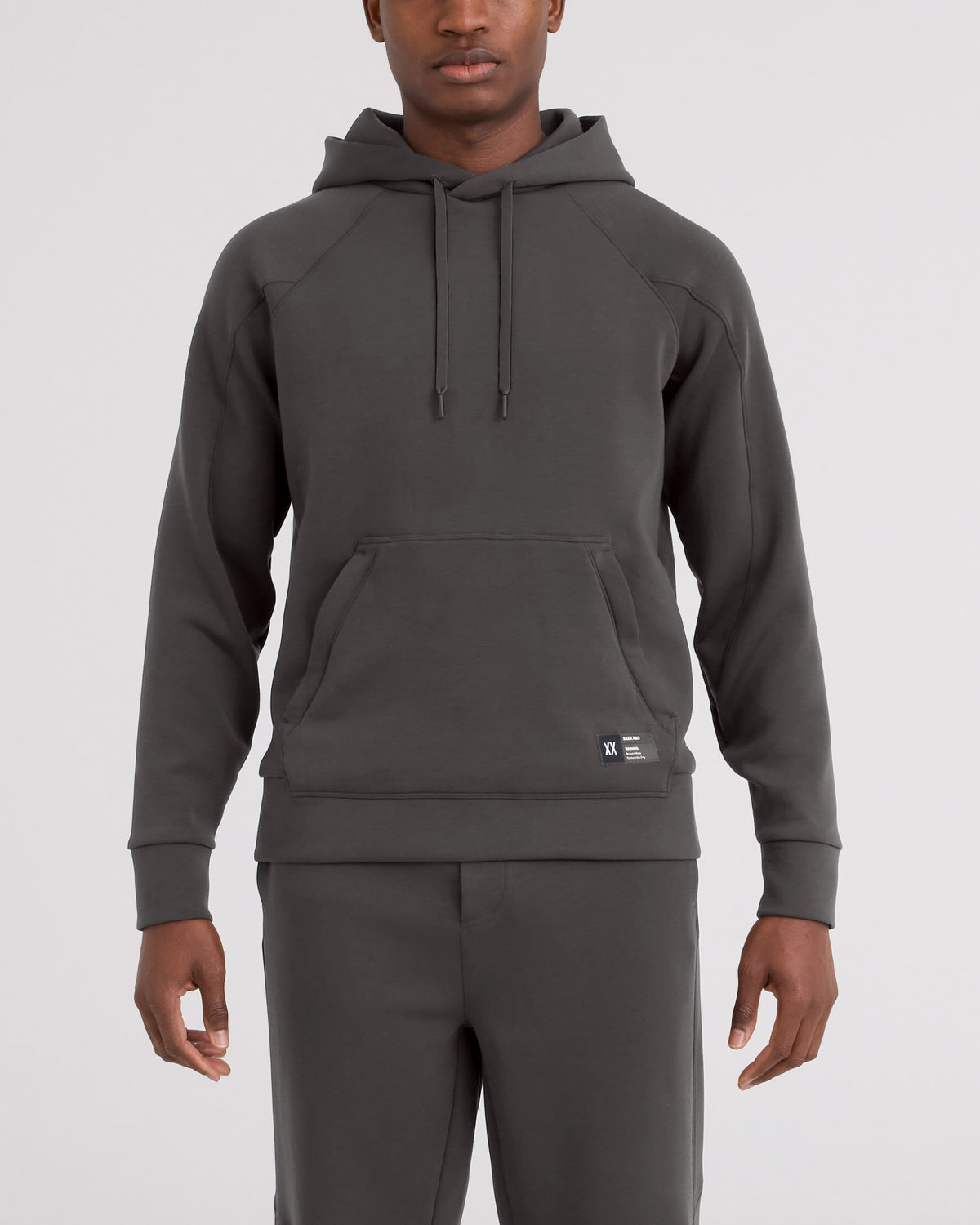 Front - Model wearing Phase Hoodie in Dark Grey