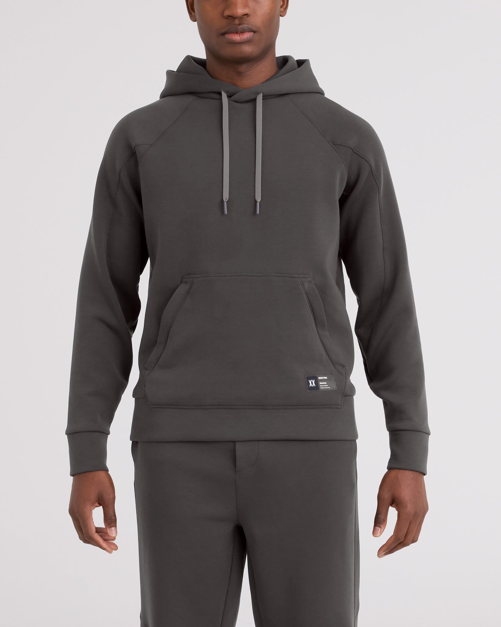 Front - Model wearing Phase Hoodie in Dark Grey