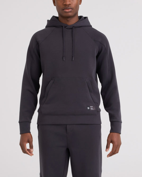 Front - Model wearing Phase Hoodie in Faded Black