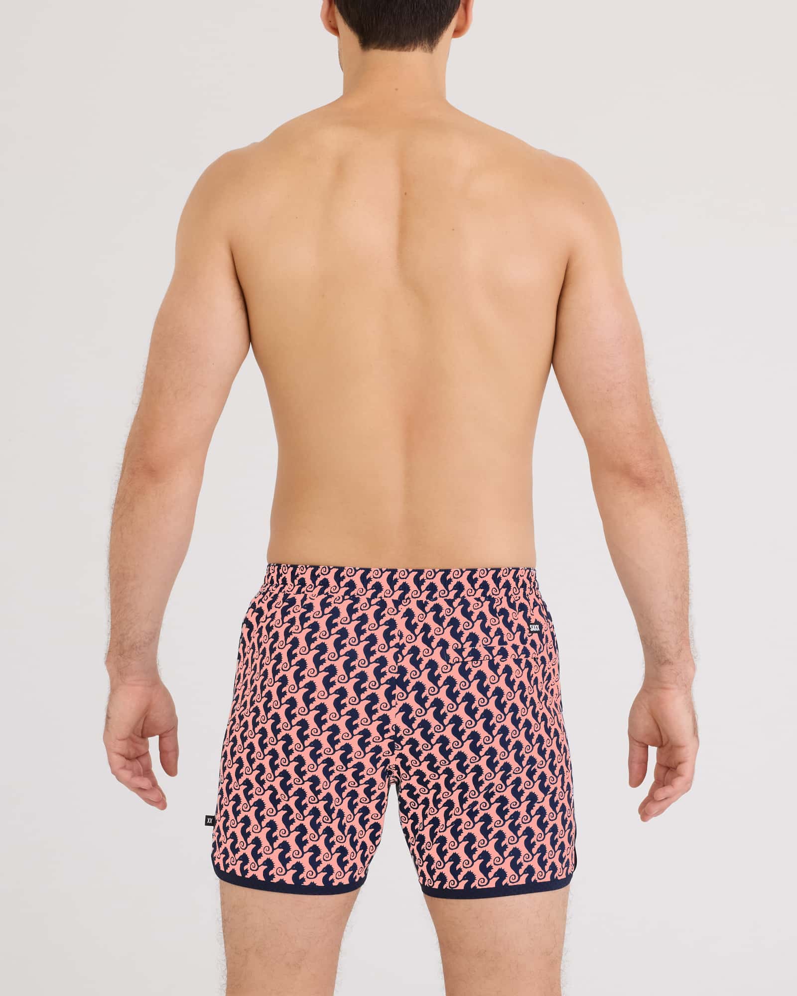 Back - Model wearing Harbormaster 2N1 Trunk 5" in Seahorse Chain-LightCoral