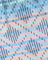 Patterned fabric with blue, pink, and green lines on a blue background