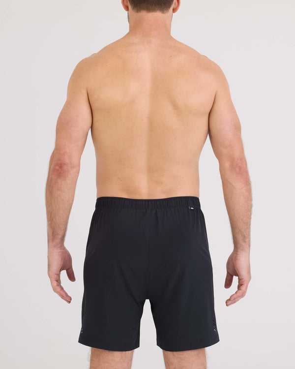 Back - Model wearing Power Moves Short 7" in Black