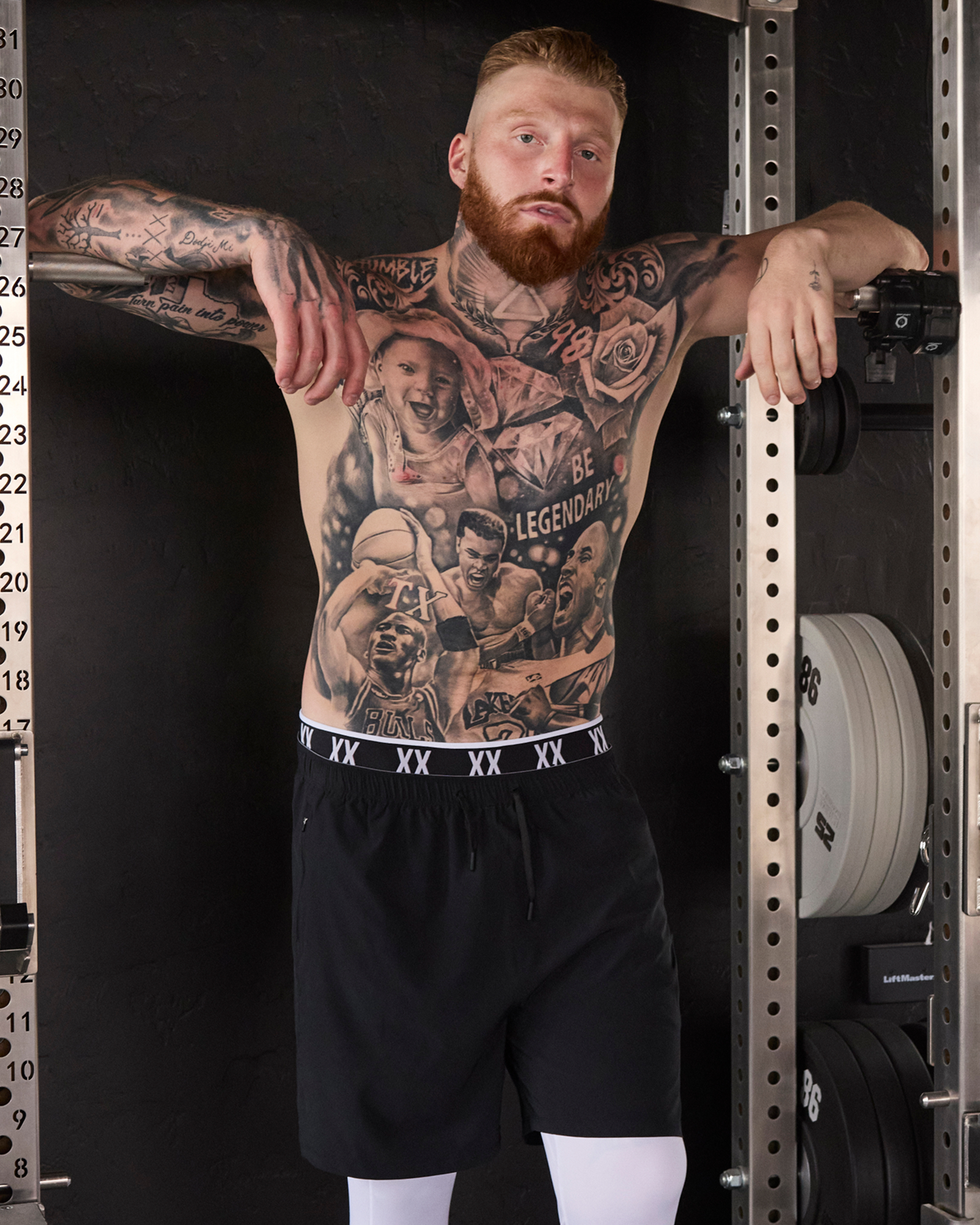 Maxx Crosby wearing SAXX Multi-Sport 3/4 Tights in White and Power Moves Shorts in Black